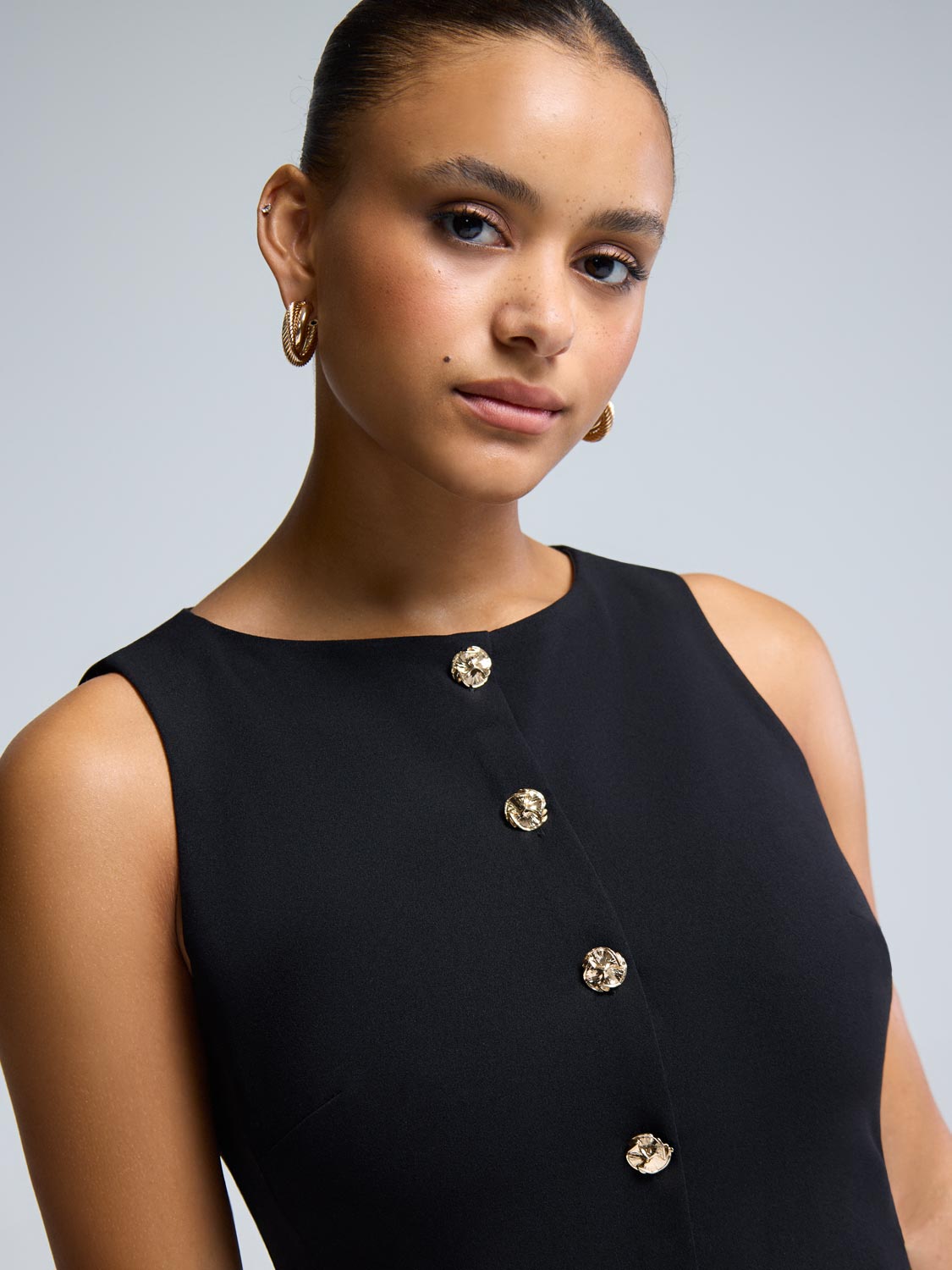 Sleeveless Mini Dress With Pleated Skirt