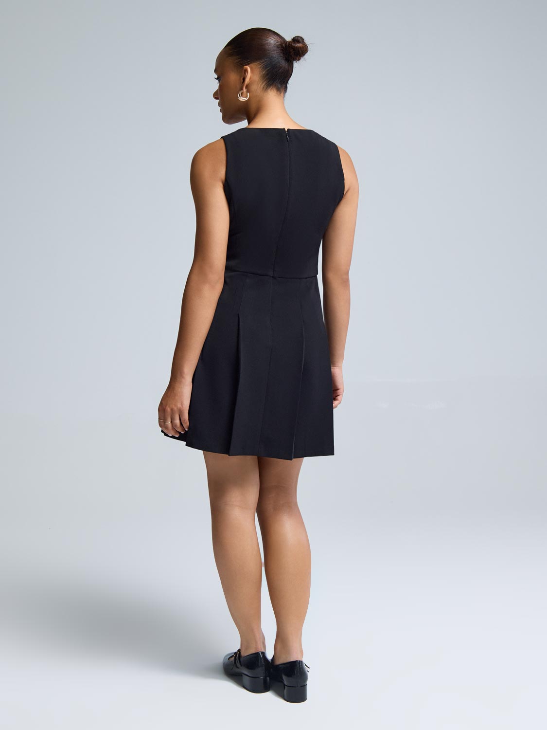 Sleeveless Mini Dress With Pleated Skirt